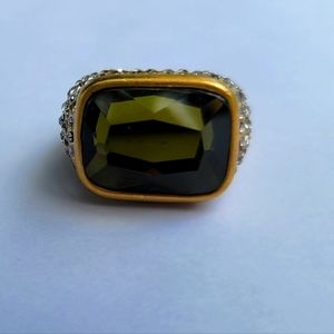 Lia sophia gold ring with green stone surrounded with diamonds